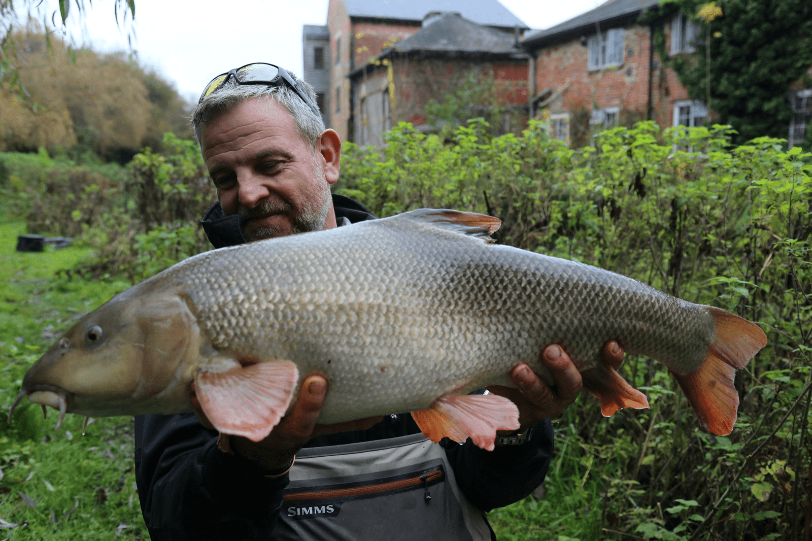 man holding fish